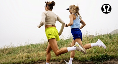 two women in activewear on a run
