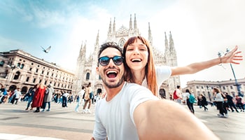 Two people taking a selfie in Milan. 