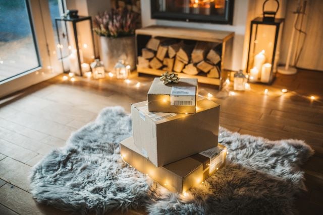 Christmas gift packages placed on the living room floor