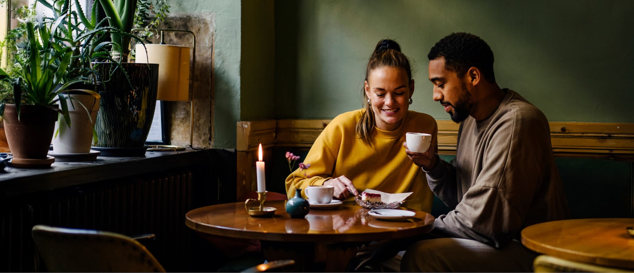 Two people drinking coffee