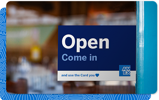 AMEX signage in storefront window that says "Open - Come in"