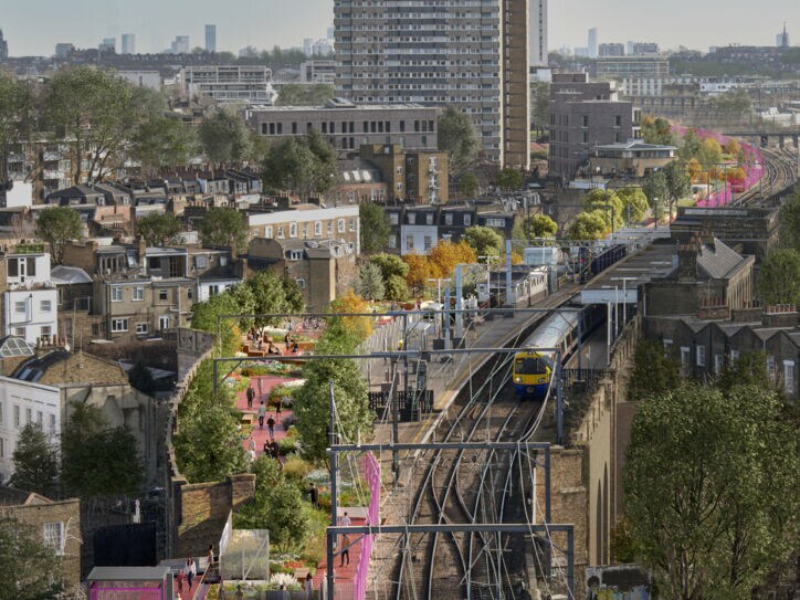 Ein Grünstreifen neben den Gleisen einer Hochbahn in einer Gro´stadt