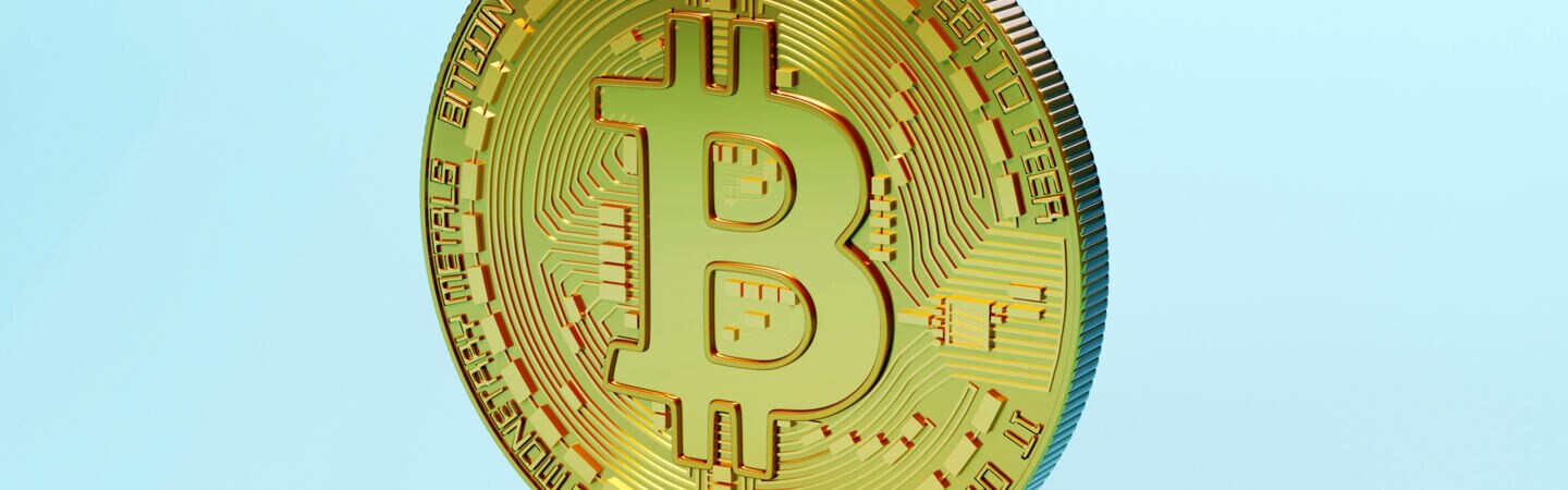 Darstellung eines Bitcoins als haptische Metallmünze