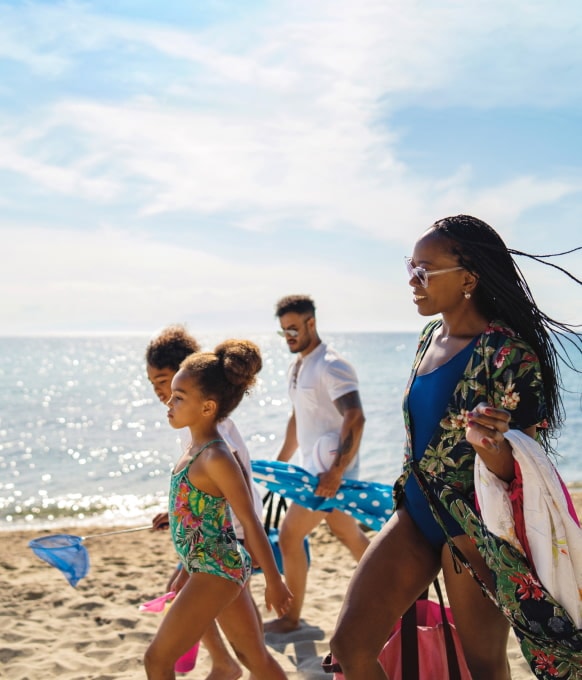 Family walking on beach